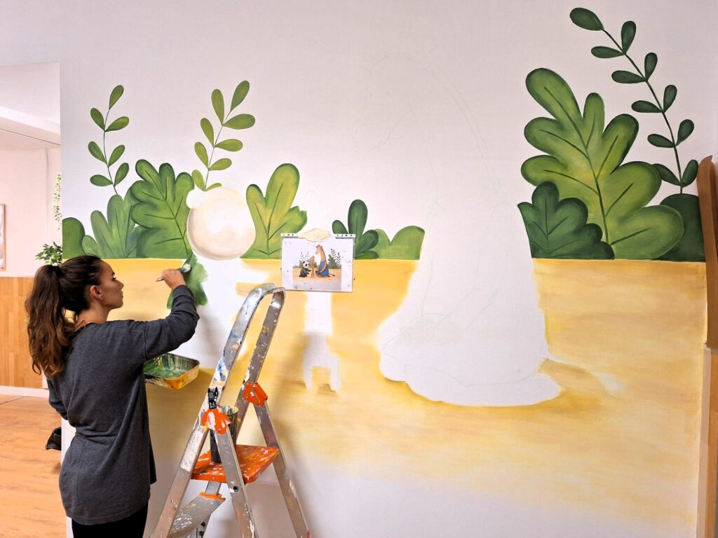 Foto del proceso de creación del nuevo mural en el Punto de Encuentro de Sabadell (Intress)